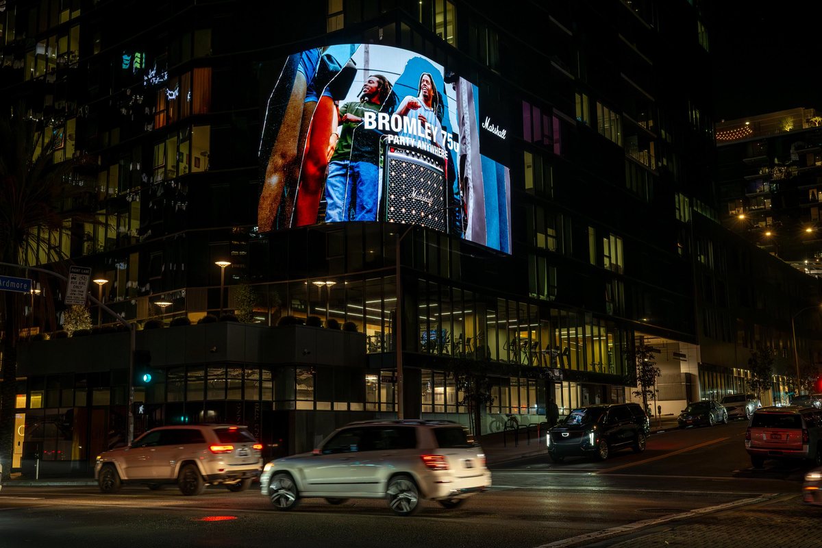 A Marshall full-motion advertising screen on Wilshire Boulevard, Los Angeles, at night