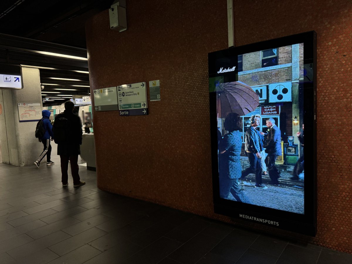 A Marshall digital advertising panel in the Paris Metro