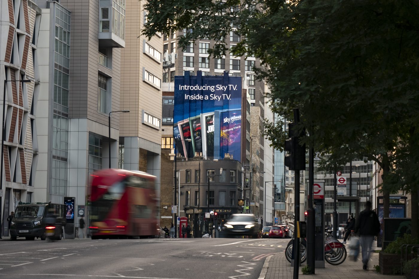 A six-storey painted wall high above an East London road